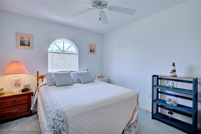 808 Chelsee Way, Lake Placid, FL 33852 - bedroom featuring carpet, a textured ceiling, and ceiling fan