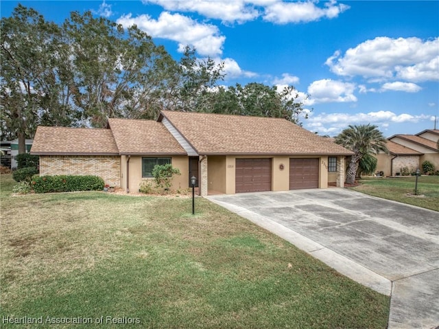 single story home featuring a front yard and a garage