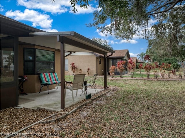 view of yard with a patio area