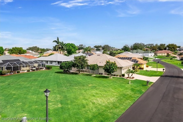 view of yard with a lanai