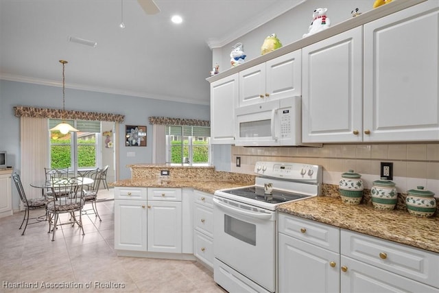kitchen featuring white appliances, white cabinetry, pendant lighting, and ornamental molding