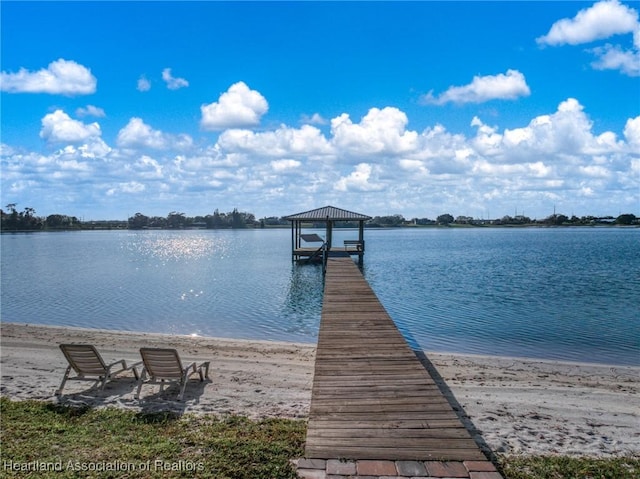 dock area with a water view