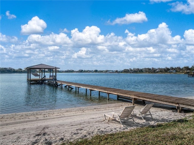 view of dock featuring a water view and boat lift