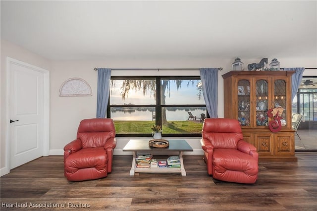 sitting room featuring wood finished floors and baseboards