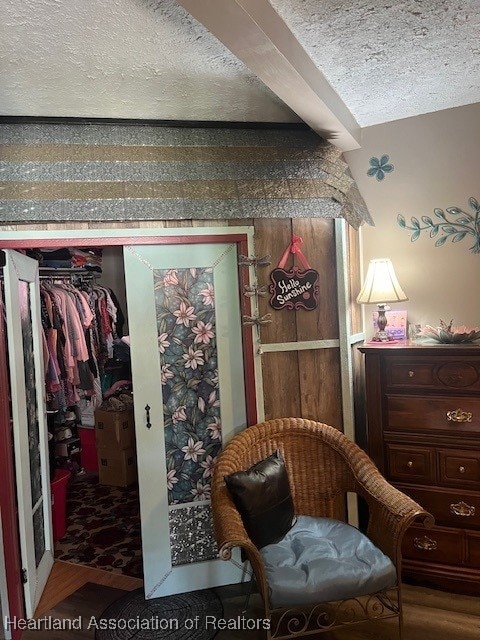 410 Walnut St, Sebring, FL 33870 - living area with a textured ceiling and wood finished floors