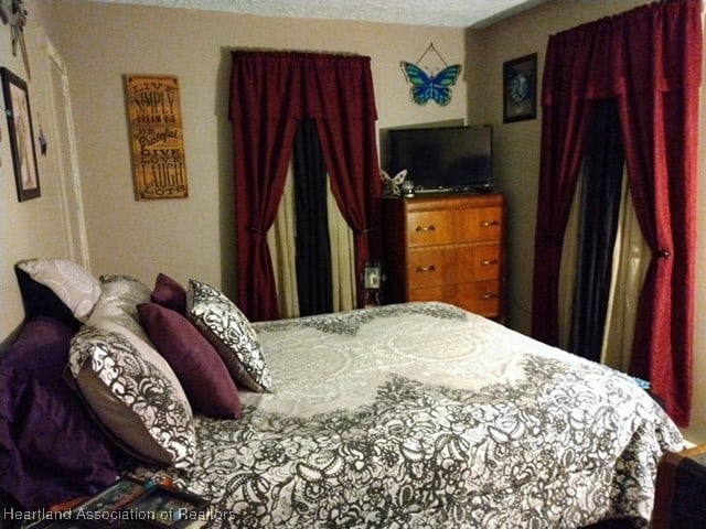 bedroom with a textured ceiling