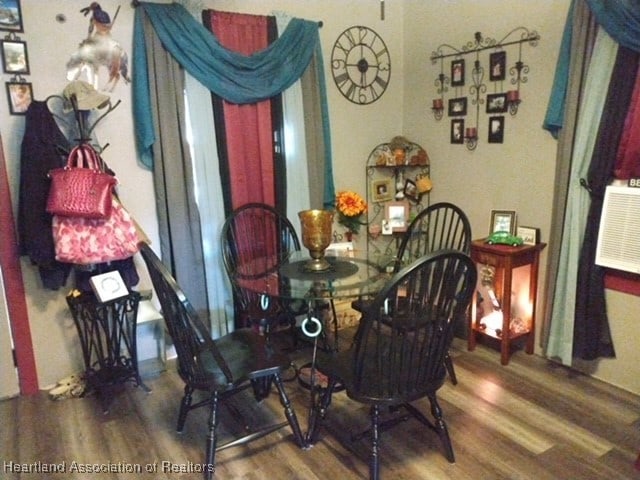 dining space featuring hardwood / wood-style floors