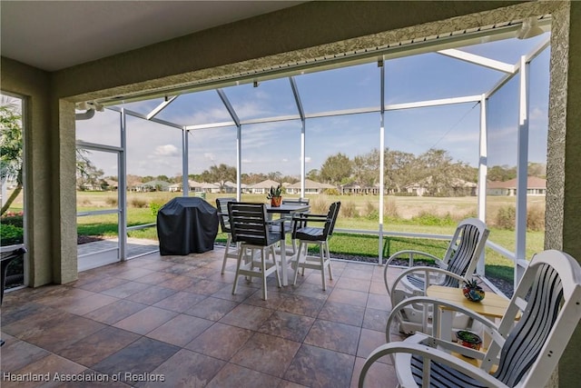 sunroom featuring a wealth of natural light