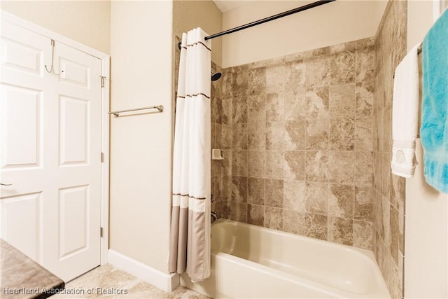 bathroom featuring shower / tub combo and tile patterned floors