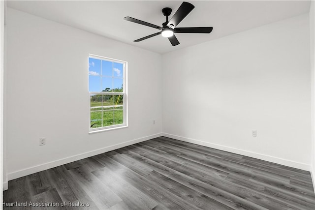 1502 Oak Ave, Lake Placid, FL 33852 - spare room featuring dark wood-type flooring, ceiling fan, and baseboards