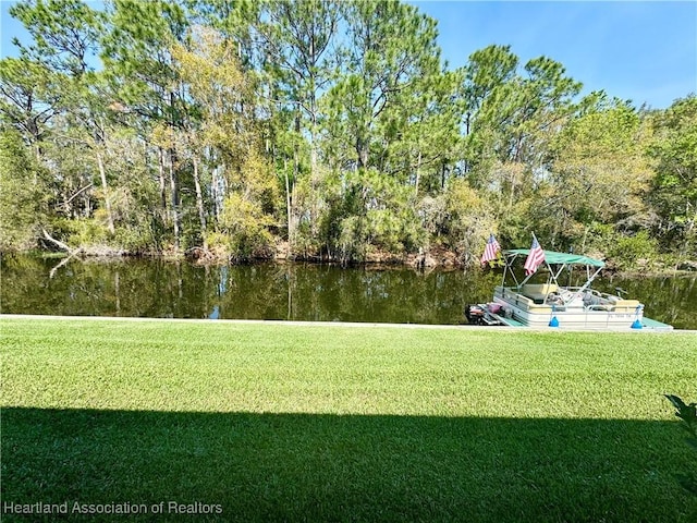 view of yard with a water view