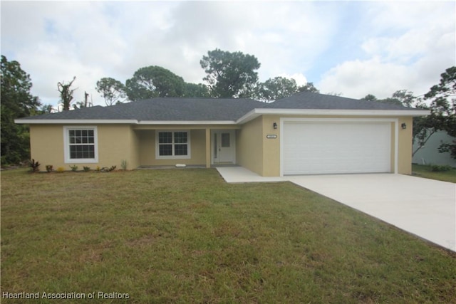 ranch-style home featuring a garage and a front lawn