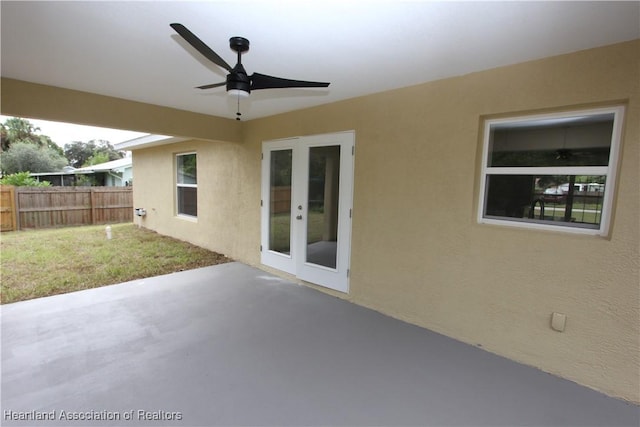 view of patio with french doors and ceiling fan