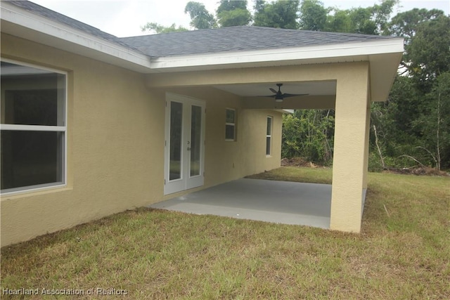 view of patio / terrace with ceiling fan and french doors