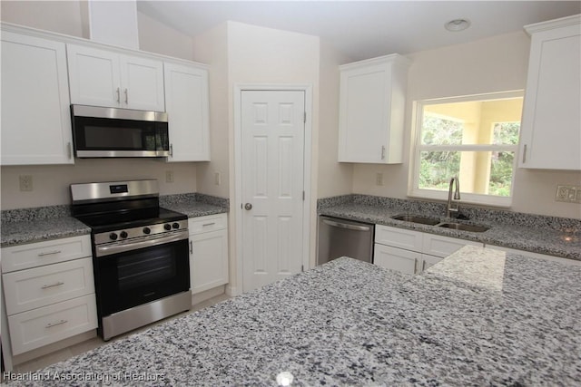 kitchen with white cabinets and stainless steel appliances