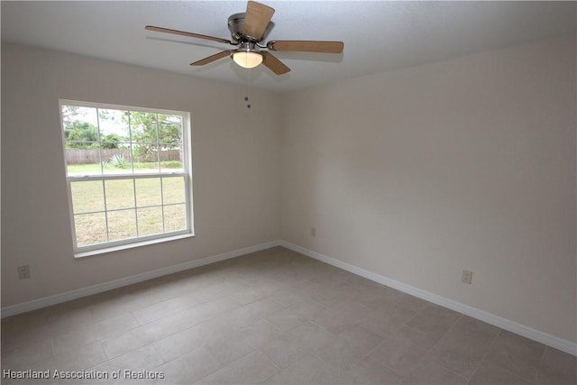 spare room featuring ceiling fan