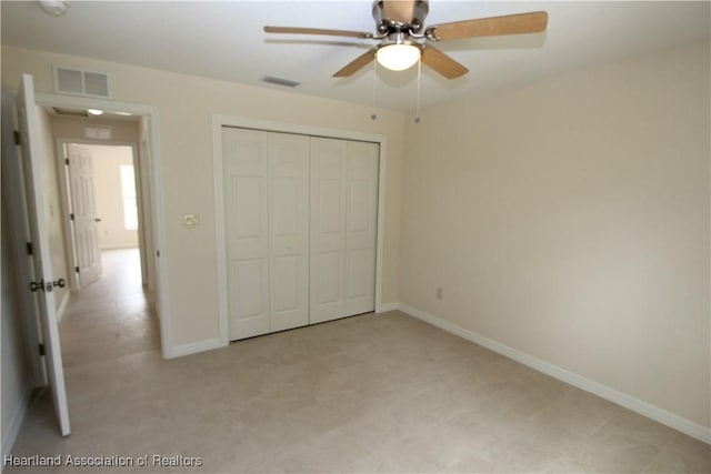 unfurnished bedroom featuring a closet and ceiling fan