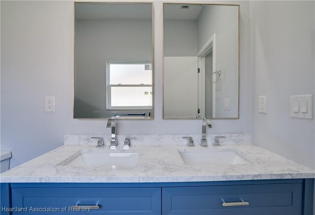 bathroom featuring vanity