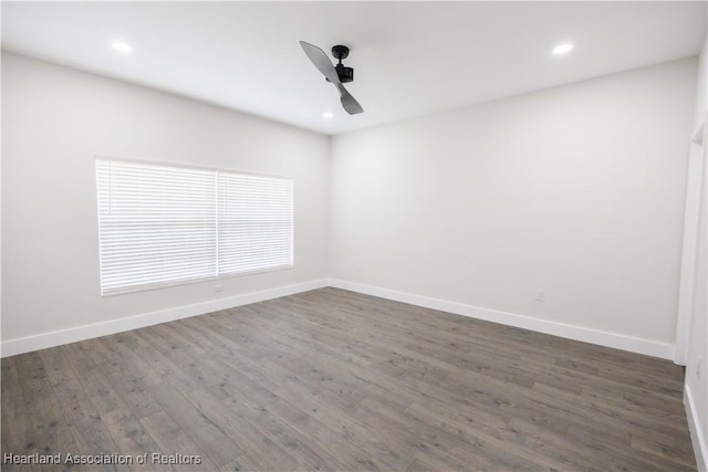 empty room featuring dark hardwood / wood-style floors