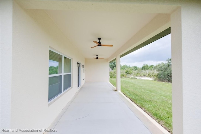 view of patio / terrace featuring ceiling fan