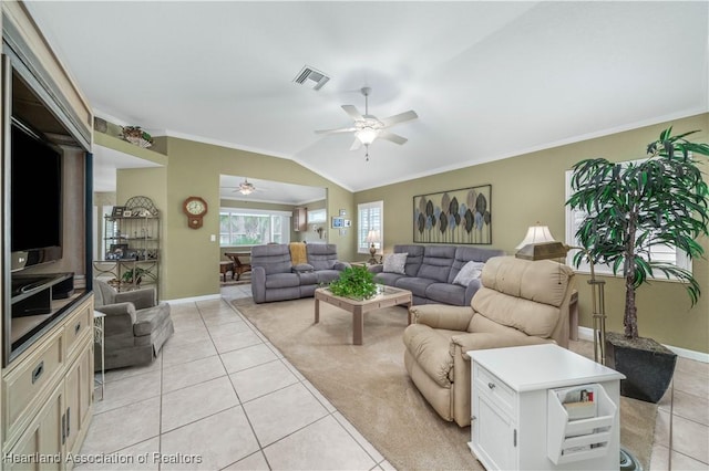 tiled living room with crown molding, ceiling fan, and lofted ceiling