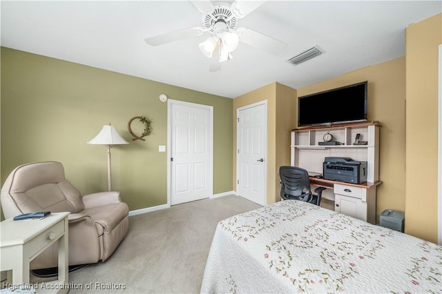 carpeted bedroom featuring ceiling fan