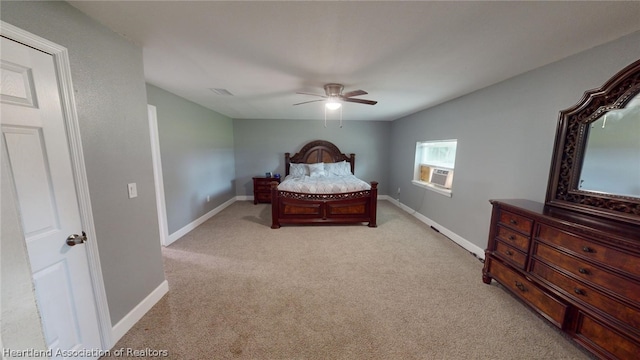 bedroom with ceiling fan, cooling unit, and light colored carpet