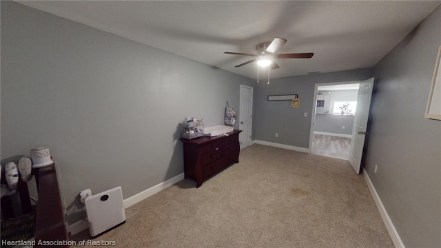 interior space featuring ceiling fan