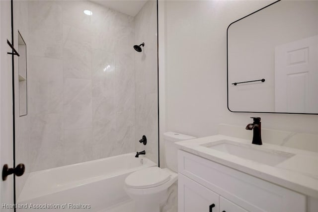 full bath featuring toilet, shower / tub combination, and vanity