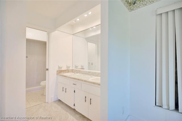 4524 Lafayette Ave, Sebring, FL 33875 - bathroom with toilet, double vanity, tile patterned floors, tiled shower, and recessed lighting