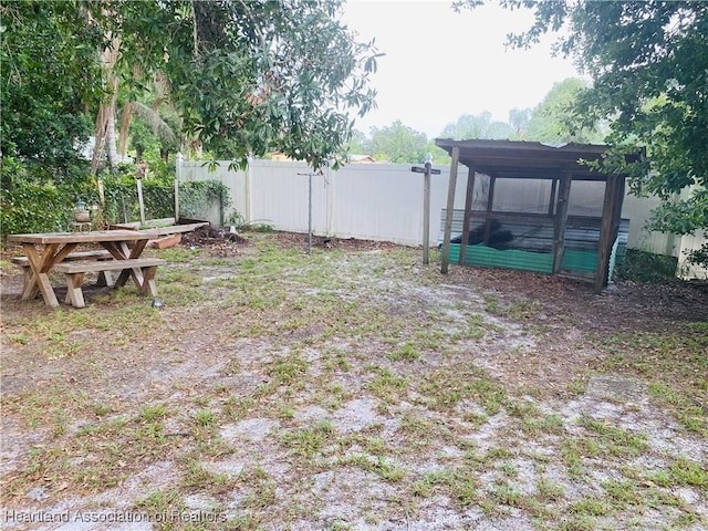 1723 Amber Ln, Lake Placid, FL 33852 - view of yard featuring fence and a sunroom