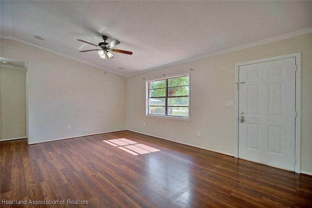 spare room with ceiling fan, dark hardwood / wood-style flooring, and crown molding