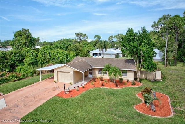 view of front of property featuring a garage and a front lawn