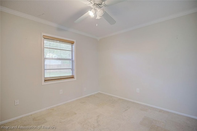 spare room with ceiling fan and ornamental molding