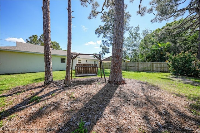 view of yard featuring fence