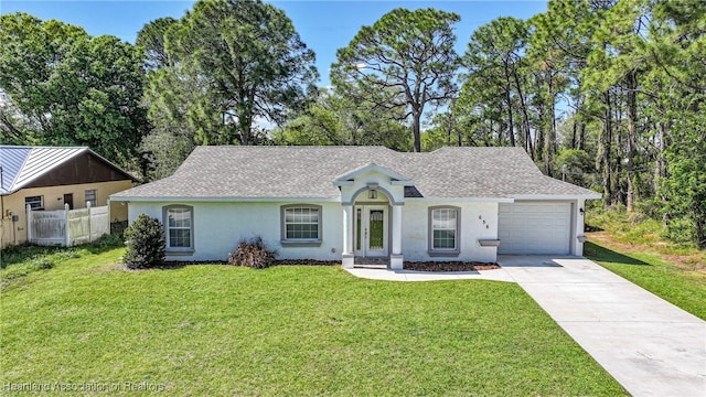 ranch-style house with a shingled roof, concrete driveway, an attached garage, a front lawn, and stucco siding