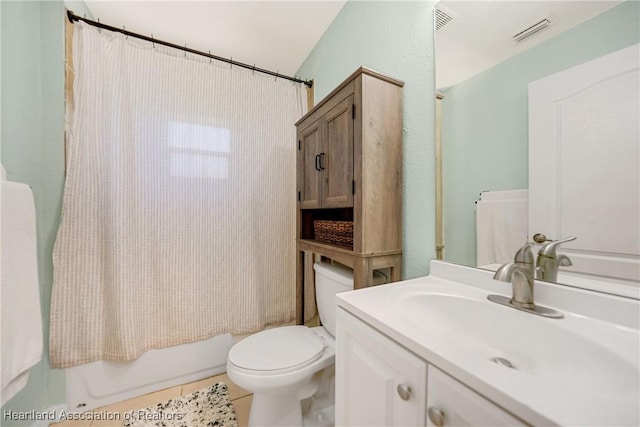 bathroom featuring toilet, shower / bath combo, visible vents, and vanity