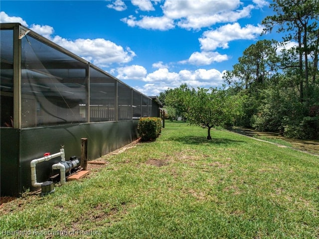 245 Lake Blvd, Sebring, FL 33875 - view of grassy yard featuring a lanai