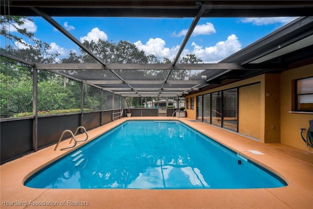 245 Lake Blvd, Sebring, FL 33875 - outdoor pool with a patio and a lanai