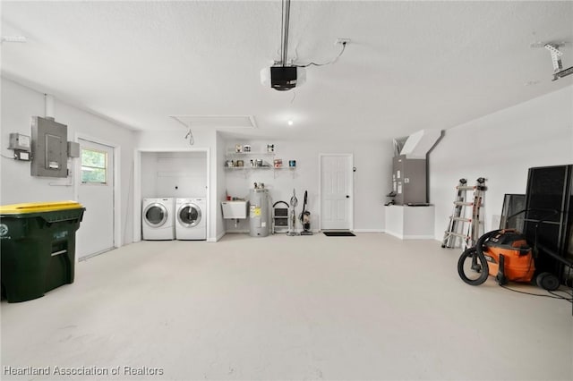 245 Lake Blvd, Sebring, FL 33875 - garage with washer and dryer, electric panel, heating unit, a garage door opener, and water heater