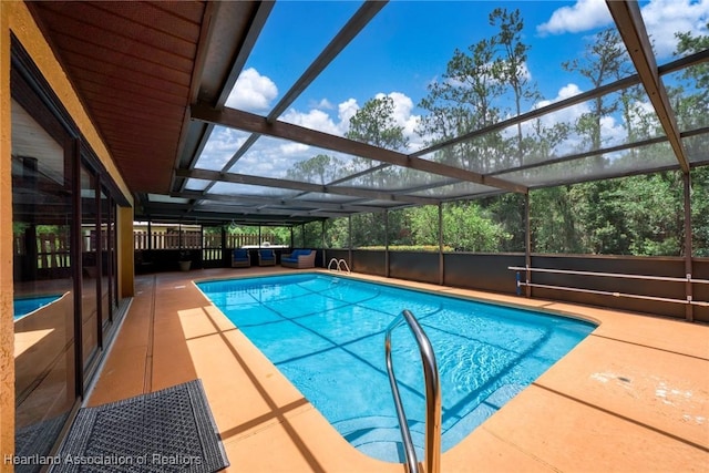 245 Lake Blvd, Sebring, FL 33875 - outdoor pool featuring a patio area, a lanai, and an outdoor living space