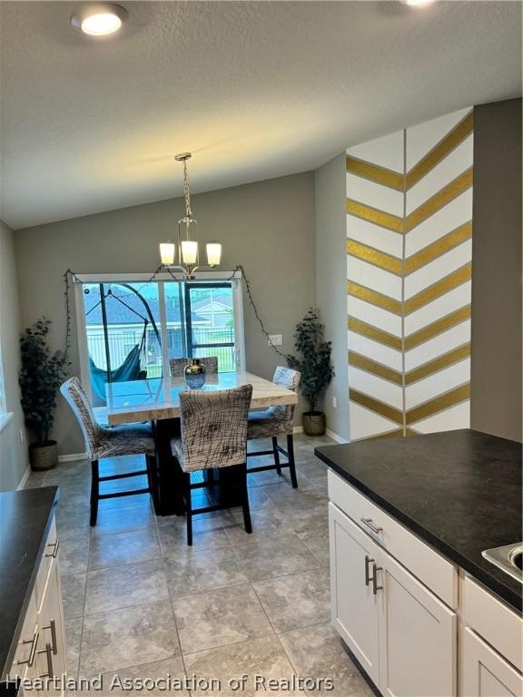 dining room featuring an inviting chandelier