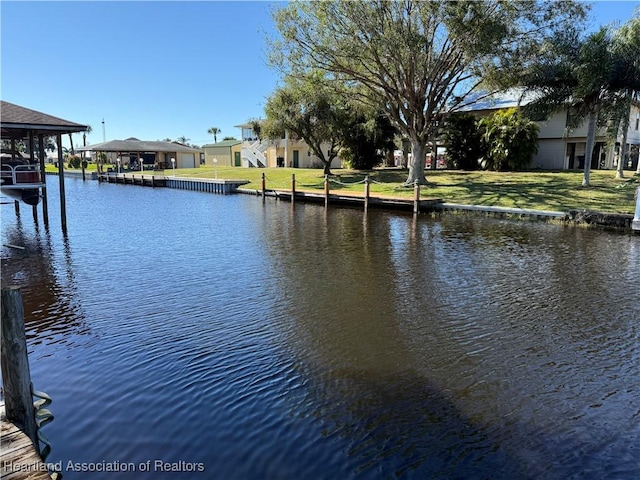 view of water feature with a boat dock