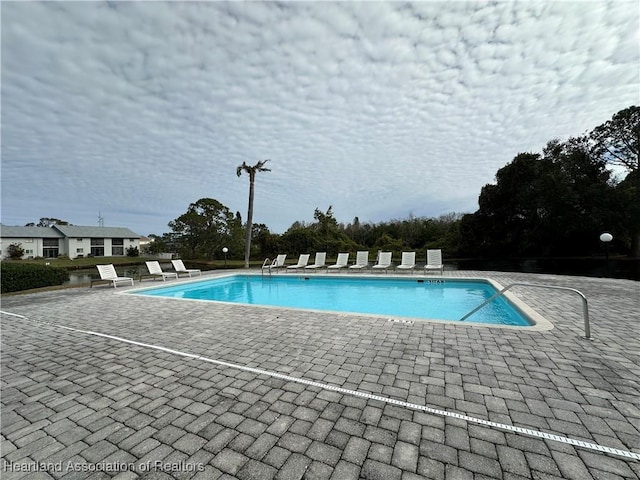 view of pool with a patio