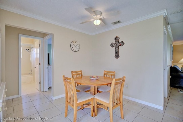 1712 Sunrise Pl, Sebring, FL 33870 - dining space with crown molding, light tile patterned flooring, and ceiling fan
