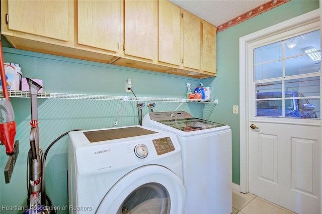 1712 Sunrise Pl, Sebring, FL 33870 - washroom with cabinet space, washing machine and dryer, and light tile patterned floors
