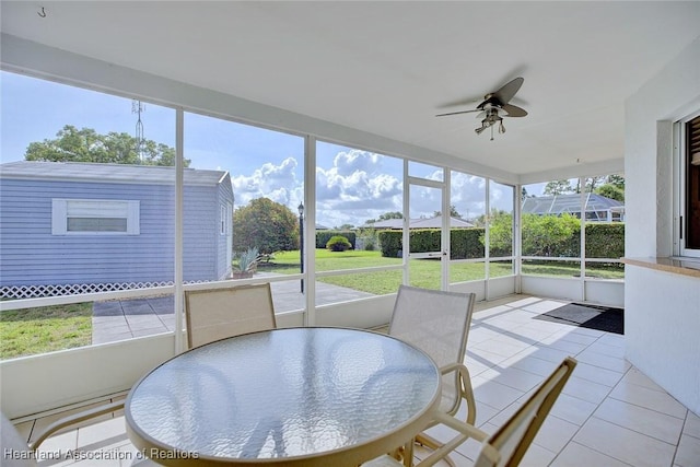 1712 Sunrise Pl, Sebring, FL 33870 - sunroom / solarium featuring a ceiling fan and outdoor dining space