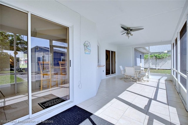 1712 Sunrise Pl, Sebring, FL 33870 - unfurnished sunroom with healthy amount of natural light and tile patterned flooring