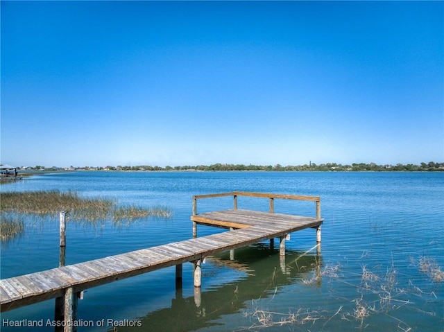1622 Dinner Dr, Sebring, FL 33870 - view of dock featuring a water view