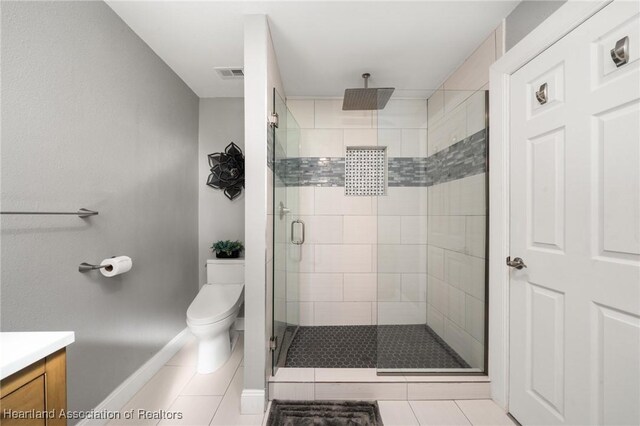 1622 Dinner Dr, Sebring, FL 33870 - full bathroom featuring visible vents, toilet, a stall shower, tile patterned flooring, and vanity
